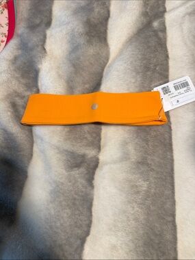 Lululemon Tiger orange Headband with Silver Logo
